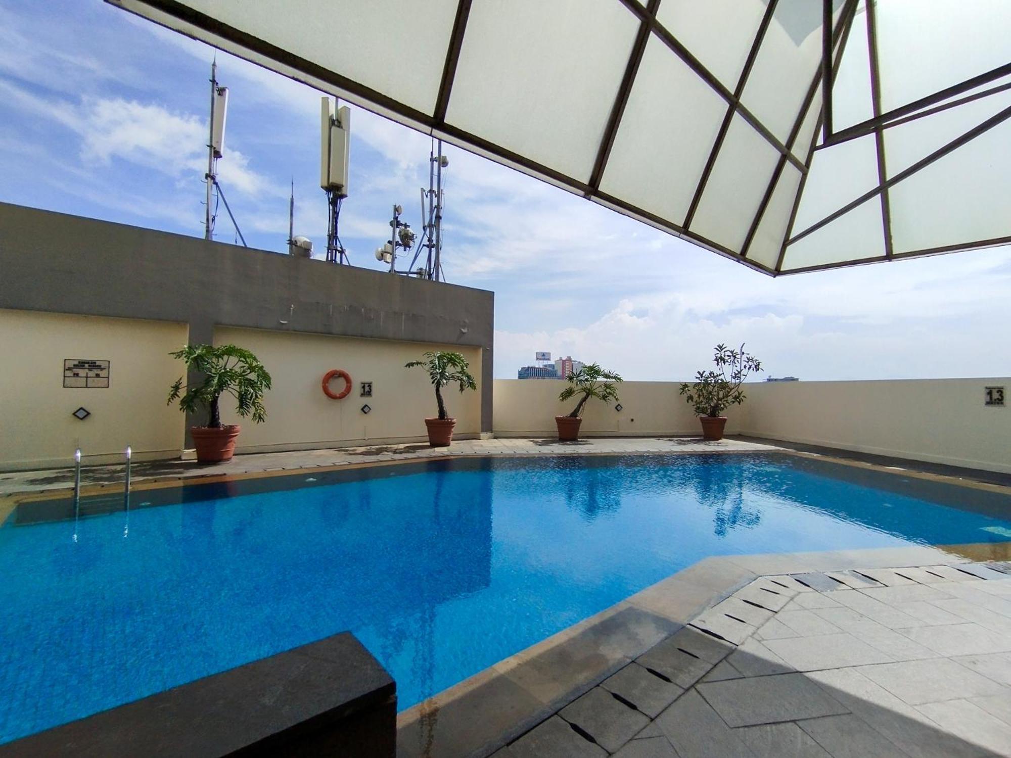 Tranquil Designed 2br At Braga Walk By Travelio